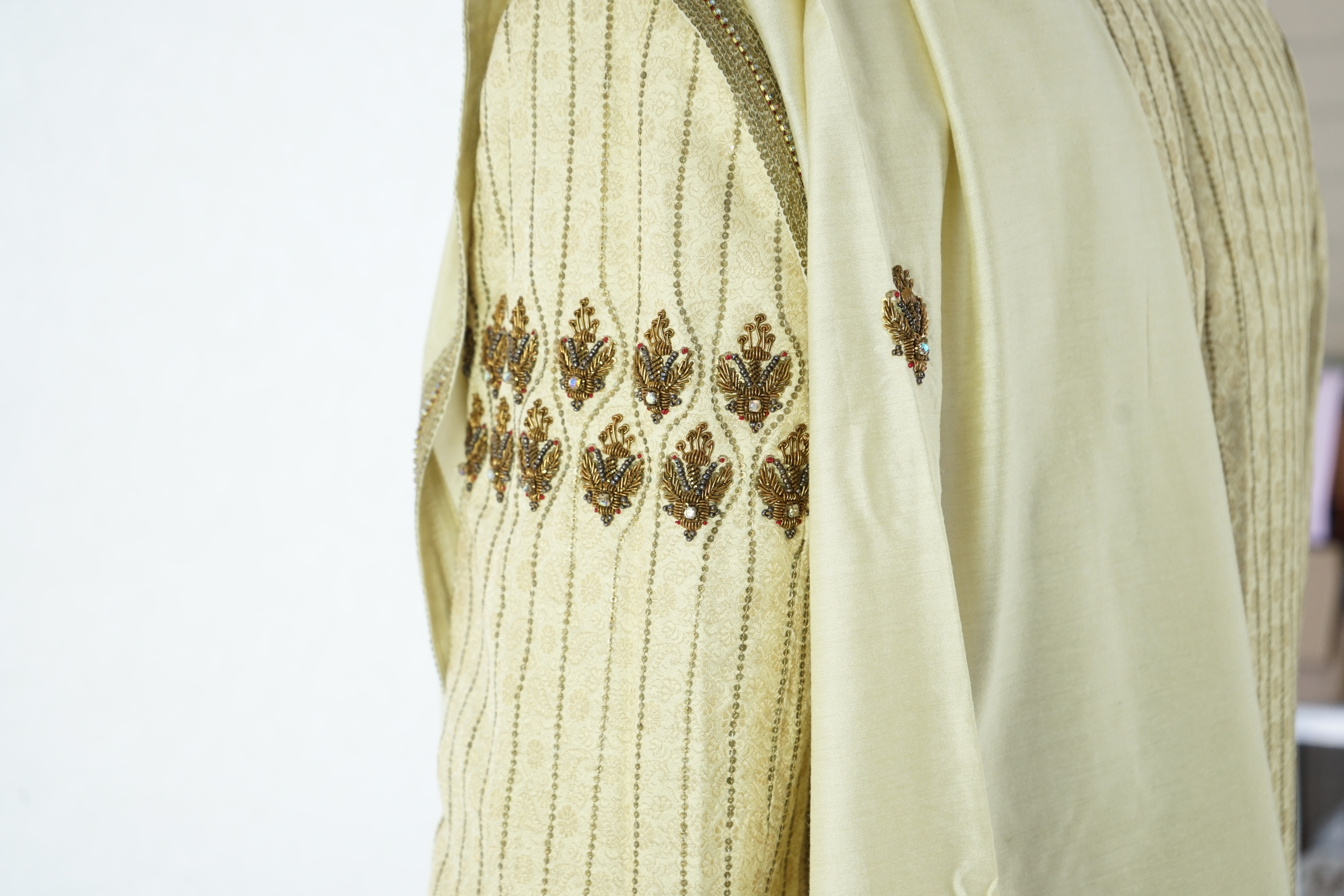 A modern Indian Men's wedding frock coat and trousers. Ex London Festival Opera - 'The Magic Flute'